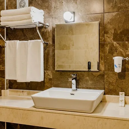 Olivia Palm Hotel