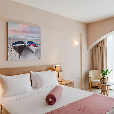 Olivia Palm Hotel